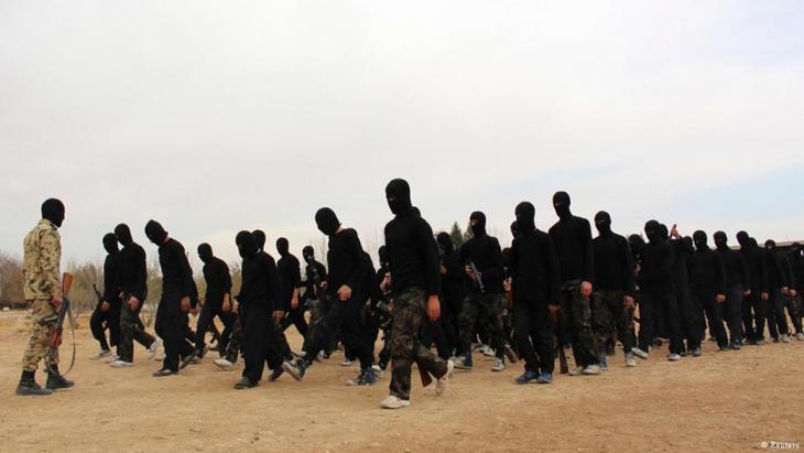 Recruits being put through their paces in an extremist training camp (photo: Reuters)
