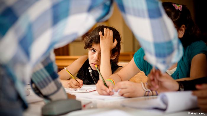 A Syrian refugee child learning maths, Karam Zeitoun School, Beirut (photo: Amy Leang)