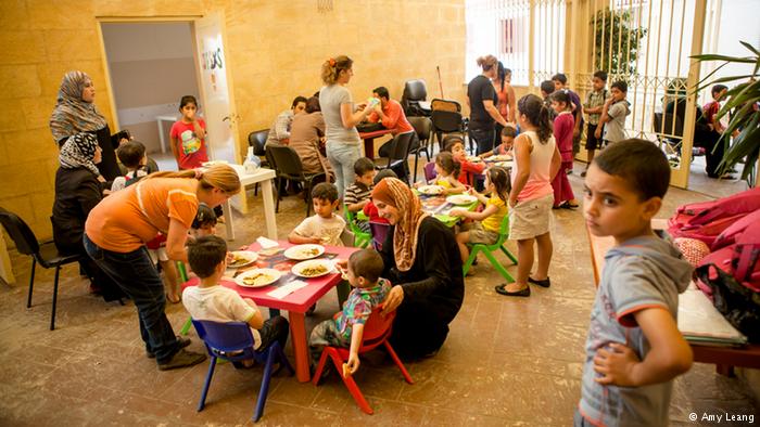 Children eating lentils, Karam Zeitoun School, Beirut (photo: Amy Leang)