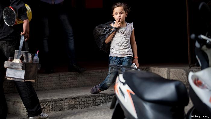 A Syrian refugee child selling tissues on a Beirut street (photo: Amy Leang)