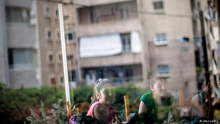 A building reflected in a classroom window, Karam Zeitoun School, Beirut (photo: Amy Leang)