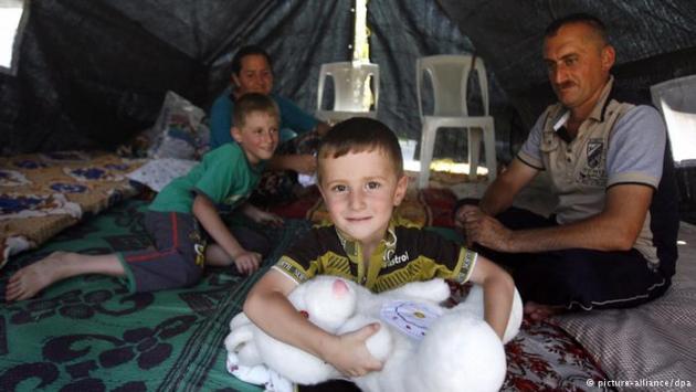 A family in a UN refugee camp (photo: picture-alliance/dpa)