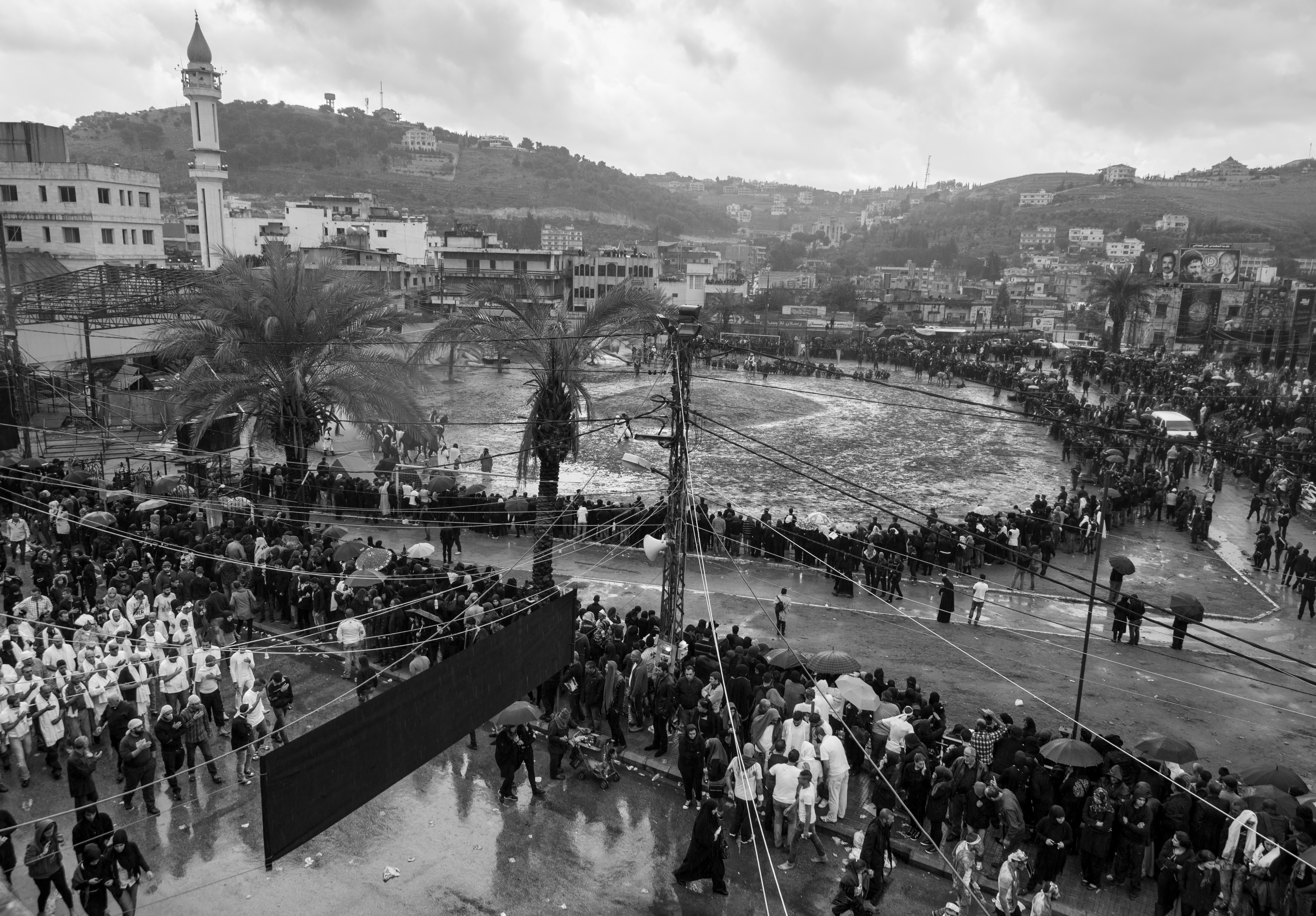 The procession of tatbir practitioners circles around the area where the Battle of Karbala is re-enacted, Nabatiyeh, Lebanon, November 2014 (photo: Maya Hautefeuille)