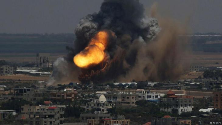 A rocket lands in Gaza city (photo: Reuters)