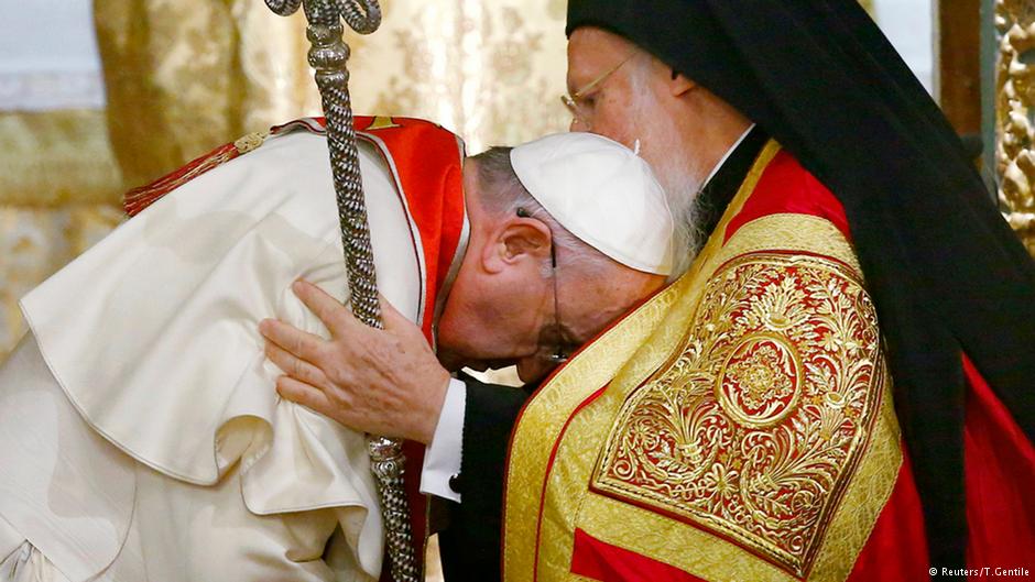 Pope Francis receives a blessing from Bartholomew I, the spiritual leader of the world's Orthodox Christians, on 29 November 2014 (photo: Reuters/T. Gentile)