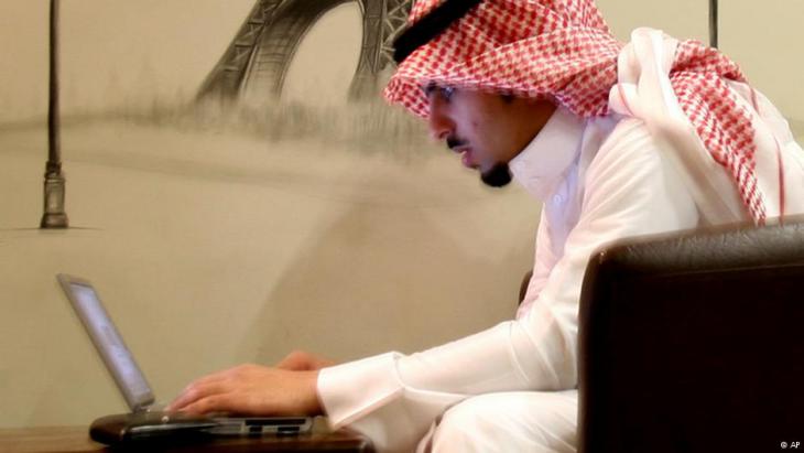 A young Saudi man in an Internet cafe in Riyadh (photo: AP)