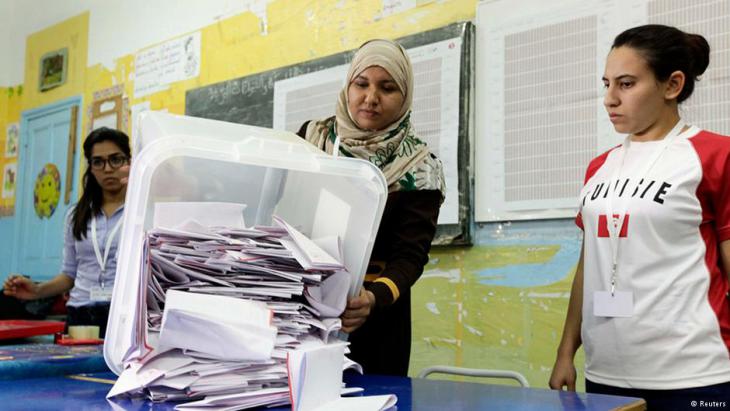 Women preparing to count votes in Tunis after the recent election (photo: Reuters)