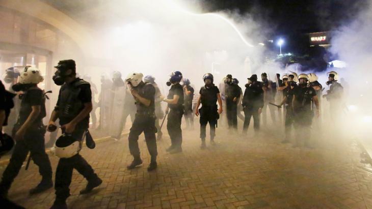 Turkish riot police in clouds of tear gas in Istanbul during the move to clear Gezi Park on 15 June 2013 (photo: Reuters)