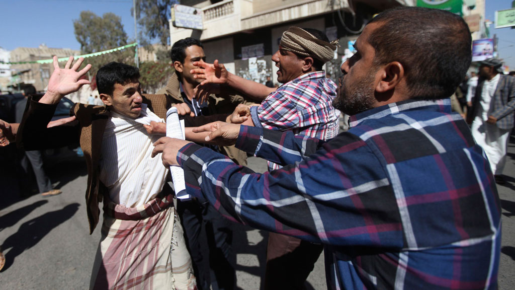 Supporters of the Houthi movement clash with anti-Houthi protesters during a rally in Sanaa, 24 January 2015 (photo: Reuters/M. al-Sayaghi)