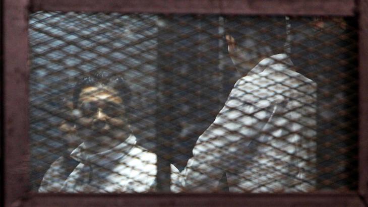 Detained members of the Muslim Brotherhood during a trial in Cairo (photo: Reuters/M. Abd El Ghany)