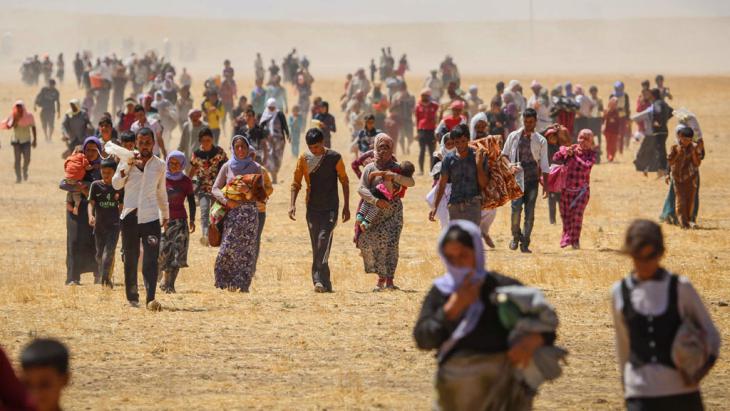 Yazidis fleeing IS in Iraq (photo: picture-alliance/AA/E. Yorulmaz)