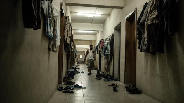Hallway of typical living quarters for foreign workers (photo: Sam Tarling)