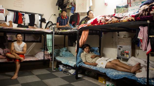 Nepalese workers in a dormitory for foreign workers, Qatar (photo: Sam Tarling)
