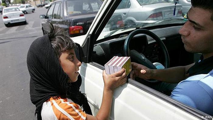 A child selling matches on a street in Tehran (photo: IRNA)