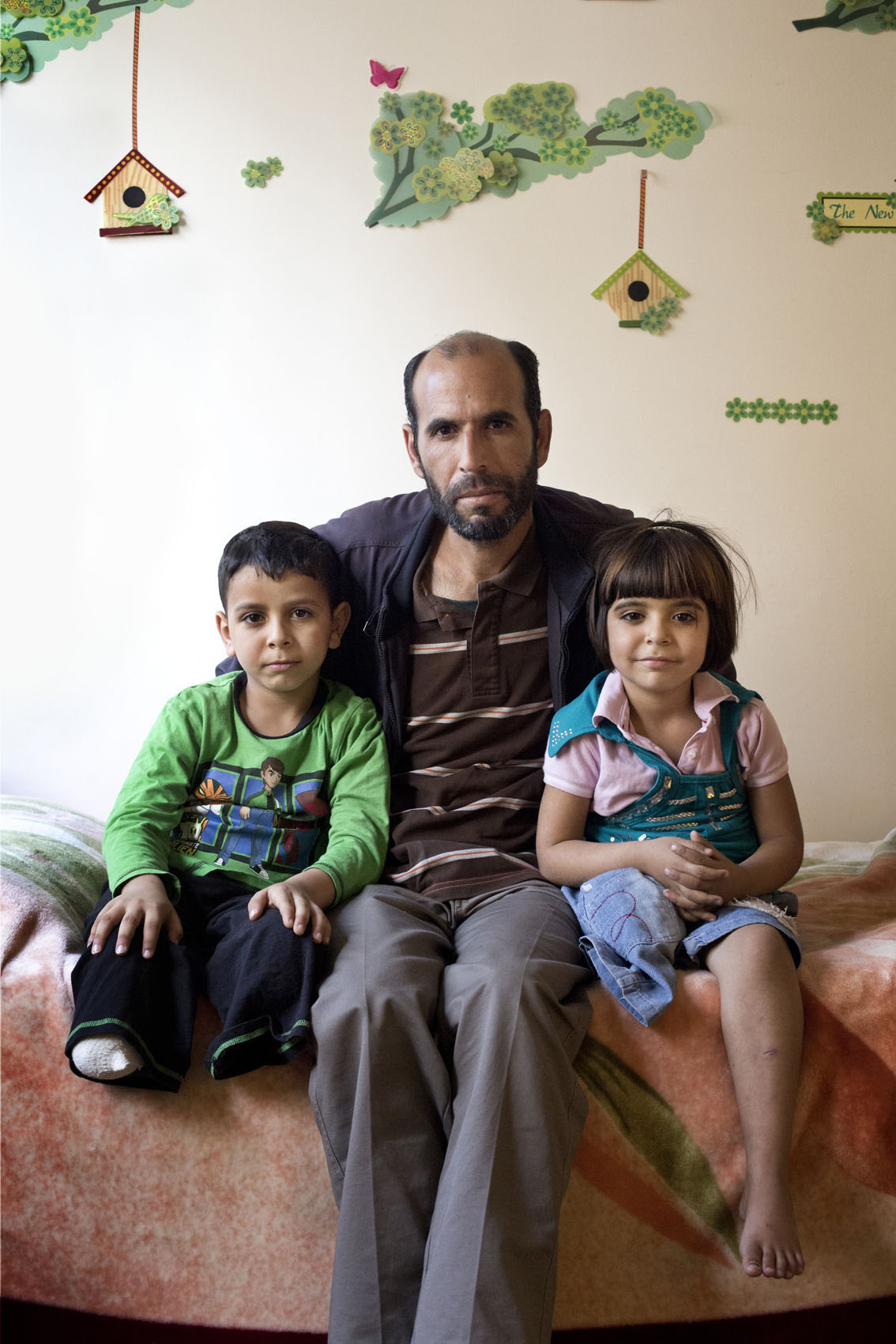'Aid, aged 8, Muhammad, aged 40, Yumna, aged 6 (photo: Kai Wiedenhofer)
