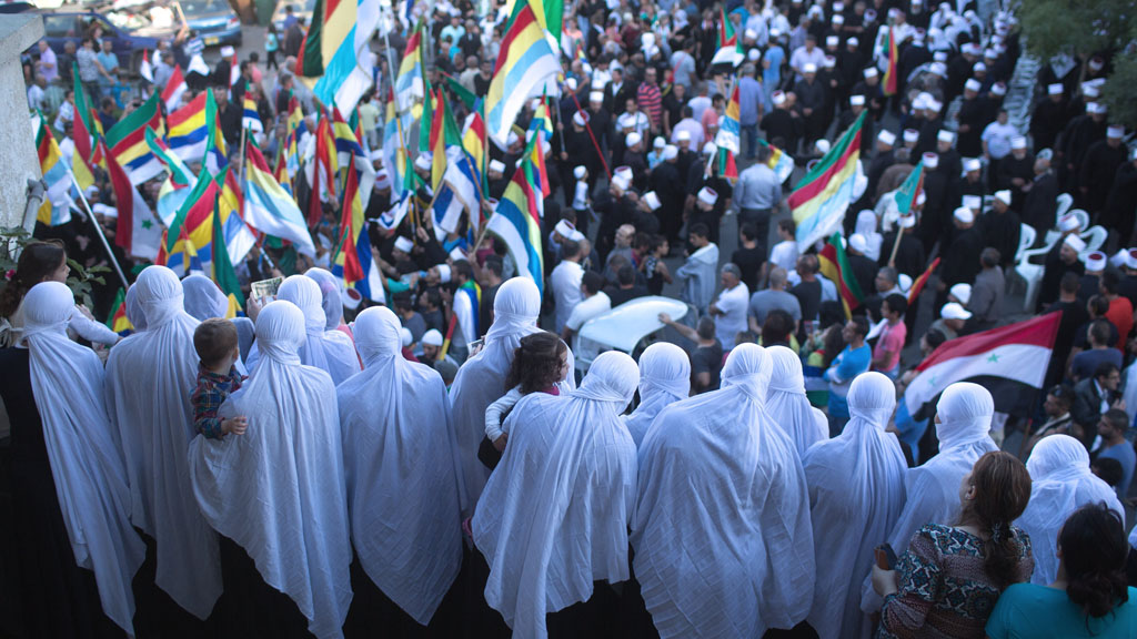 Members of the Druze community in the Golan Heights during a demonstration in support of Syrian President Bashar al-Assad's army, Majdal Shams, 15 June 2015 (photo: MENAHEM KAHANA/AFP/Getty Images)
