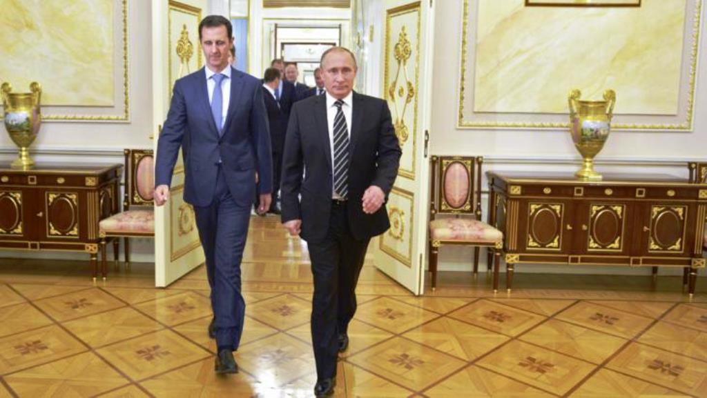 بوتين والأسد. رويترز