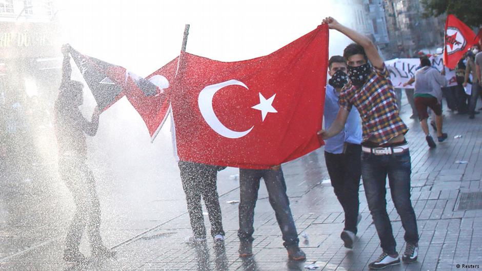 Police sprayed water cannon to disperse dozens of people in front of the offices of Kanalturk and Bugun TV (photo: REUTERS/Murad Sezer)