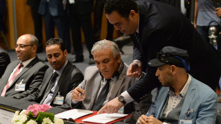 Political parties in Libya sign up to the UN peace plan on 11 July 2016 (photo: F. Senna/AFP/Getty Images)