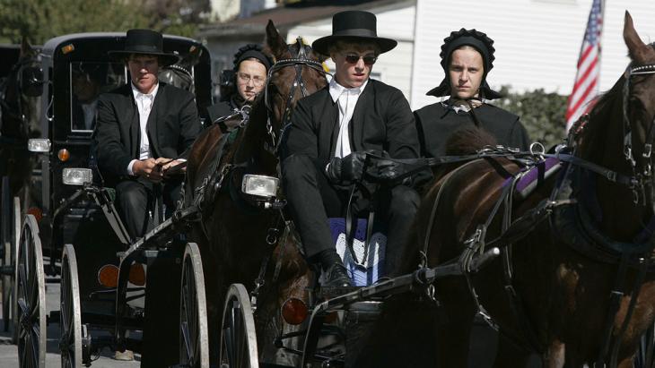 Members of the Old Order of the Amish in Bart Township, Pennsylvania (photo: Getty Images)