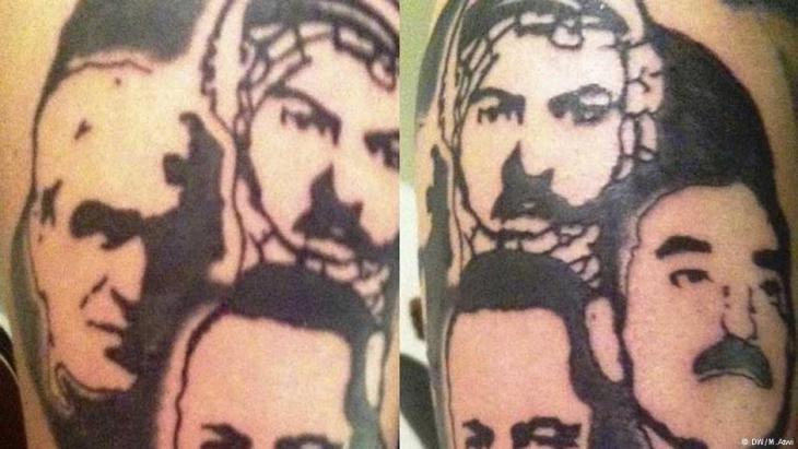 Man from Beirut with the faces of the leaders of the PFLP (People′s Front for the Liberation of Palestine) tattooed onto his biceps (photo: DW)
