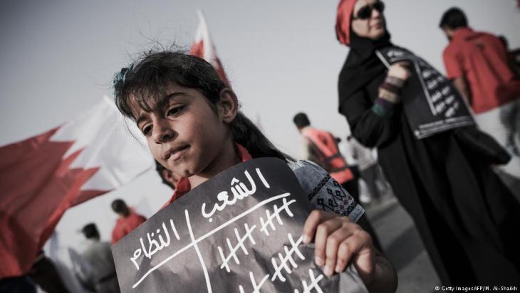 A young girl in A′ali, Bahrain, attends an anti-government demonstration (photo: Mohammed Al-Shaikh/AFP/Getty Images)