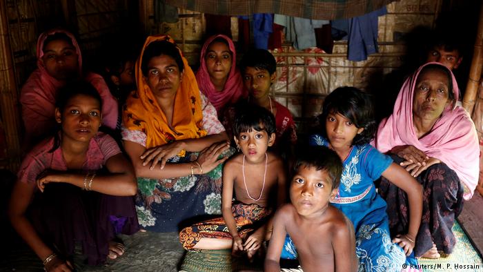 Rohingya refugees take shelter at the Kutuupalang makeshift refugee camp