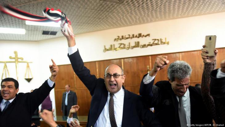 Khaled Ali celebrates his legal victory over President Sisi in a Cairo courtroom (photo: AFP/Getty Images)