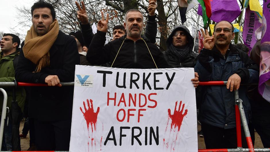 Kurdish protesters shout slogans during a demonstration against the ongoing Turkish military campaign in the Kurdish-held Syrian enclave of Afrin in front of the Turkish embassy in Berlin on 26 January 2018 (photo: AFP/Gettty Images/John Macdougall)