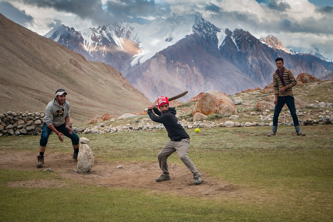 Young Wakhi men playing cricket (photo: Camille Del Bos)