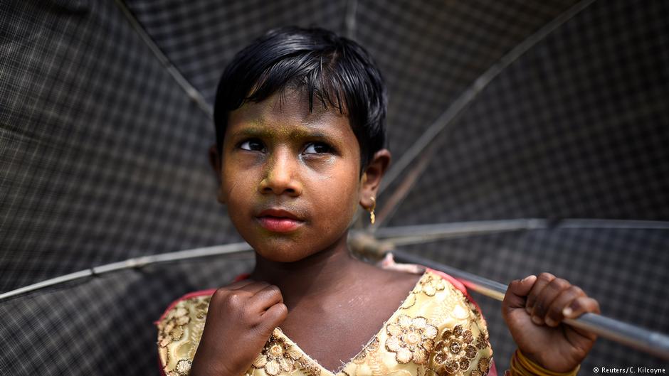 A Rohingya refugee girl named Zinu Ara, aged 4, poses for a photograph as she wears thanaka paste at Balukhali camp in Cox's Bazaar, Bangladesh, 31 March 2018 (photo: Reuters/Clodagh Kilcoyne)