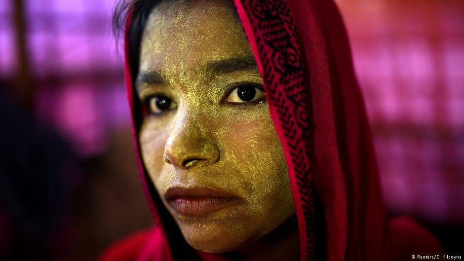 A Rohingya refugee woman named Laila Begum, aged 23, poses for a photograph as she wears thanaka paste at Balukhali camp in Cox's Bazaar, Bangladesh, 31 March 2018 (photo: Reuters/Clodagh Kilcoyne)