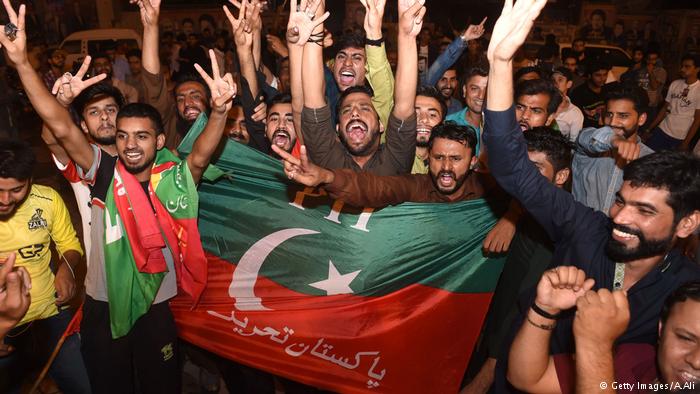 Imran Khan supporters celebrate PTI's election victory (photo: Getty Images/A. Ali)