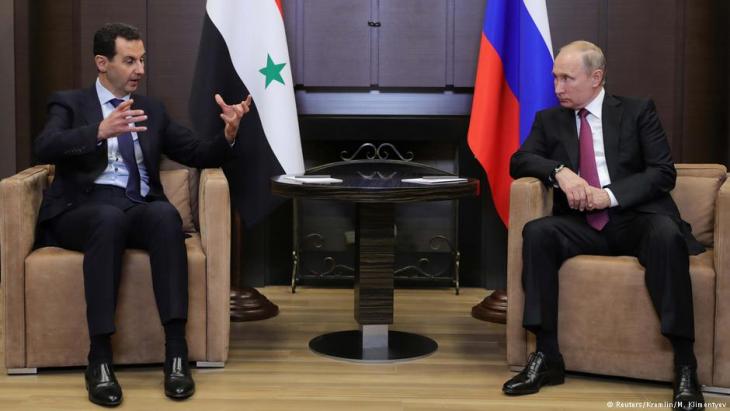Bashar al-Assad in a meeting with Vladimir Putin (photo: Reuters)
