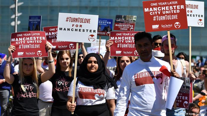 #TurnToLove march in Manchester, England, one year after a terrorist attack killed 22 people at an Ariana Grande concert in May 2017 (Getty Images/L. Neal)