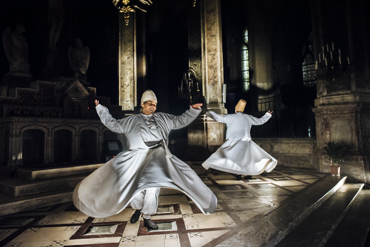 Whirling dervishes dance to the sound of Sufi songs in the Church of Saint Merry on 4 June 2017 (photo: Jan Schmidt-Whitley)