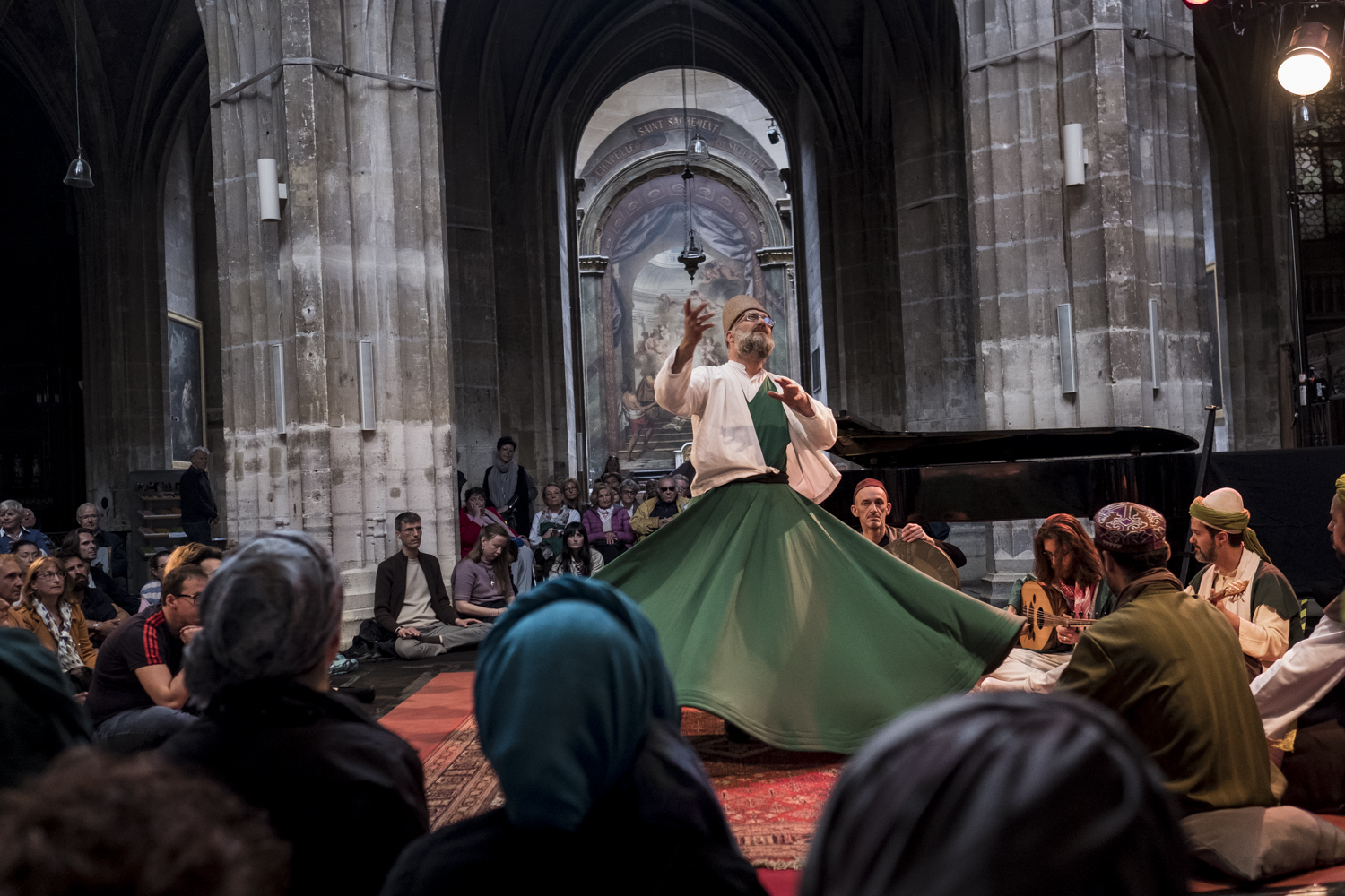 The Dervish Spirit Ensemble performs in front of the audience in Saint Merry on 9 June 2019 (photo: Jan Schmidt-Whitley / Le Pictorium)