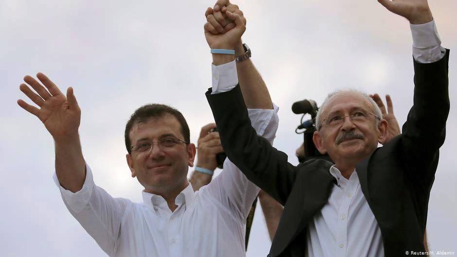 Ekrem Imamoglu, main opposition Republican People's Party (CHP) mayoral candidate, and Kemal Kilicdaroglu, leader of CHP, greet their supporters during an election rally in Istanbul, Turkey, 23 June  2019 (photo: Reuters/H. Aldemir)