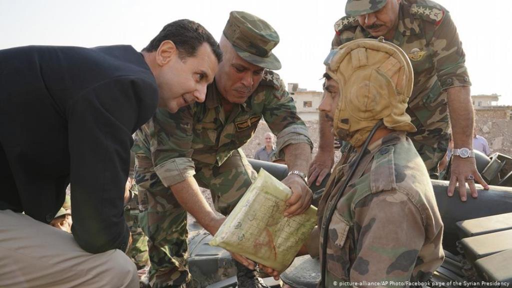 Syrien Habeet, Provinz Idlib | Präsident Baschar al-Assad (picture-alliance/AP Photo/Facebook page of the Syrian Presidency)