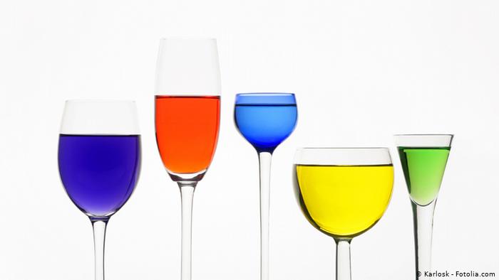 Wine glasses, different shapes, filled with colourful liquid (photo: Karlosk - Fotolia.com)