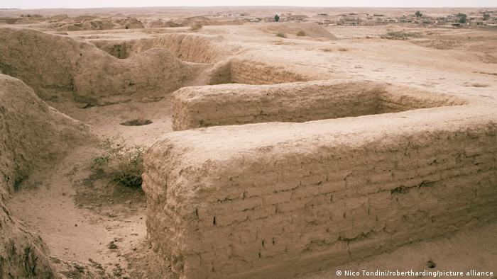 Remains of walls surrounded by arid landscape
