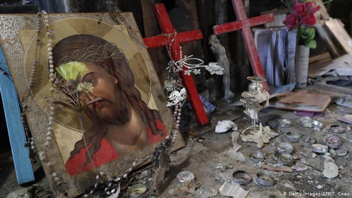 Destroyed items including a painting of Jesus