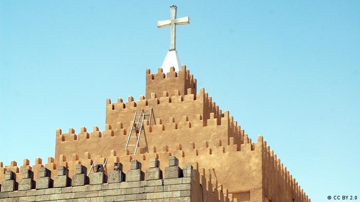 View of a church building, the Chaldean Catholic Cathedral, with a cross of top
