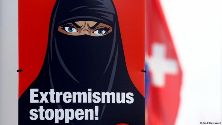 Poster urging Swiss voters to approve a ban on full-face veils in a recent referendum (photo: Arnd Wiegmann)
