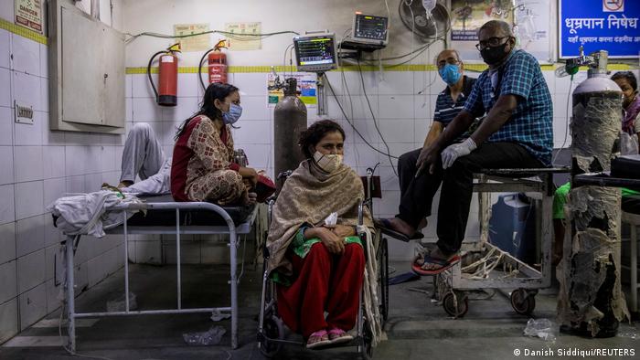 Patients suffering from COVID-19 get treatment at the casualty ward in Lok Nayak Jai Prakash (LNJP) hospital