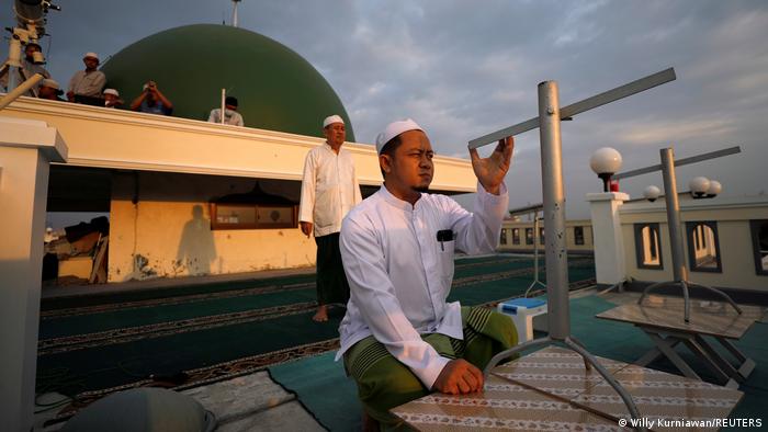 Muslims in Jakarta, Indonesia, use traditional tools to sight the crescent moon