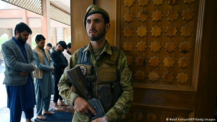 An Afghan security guard at a mosque in Kabul