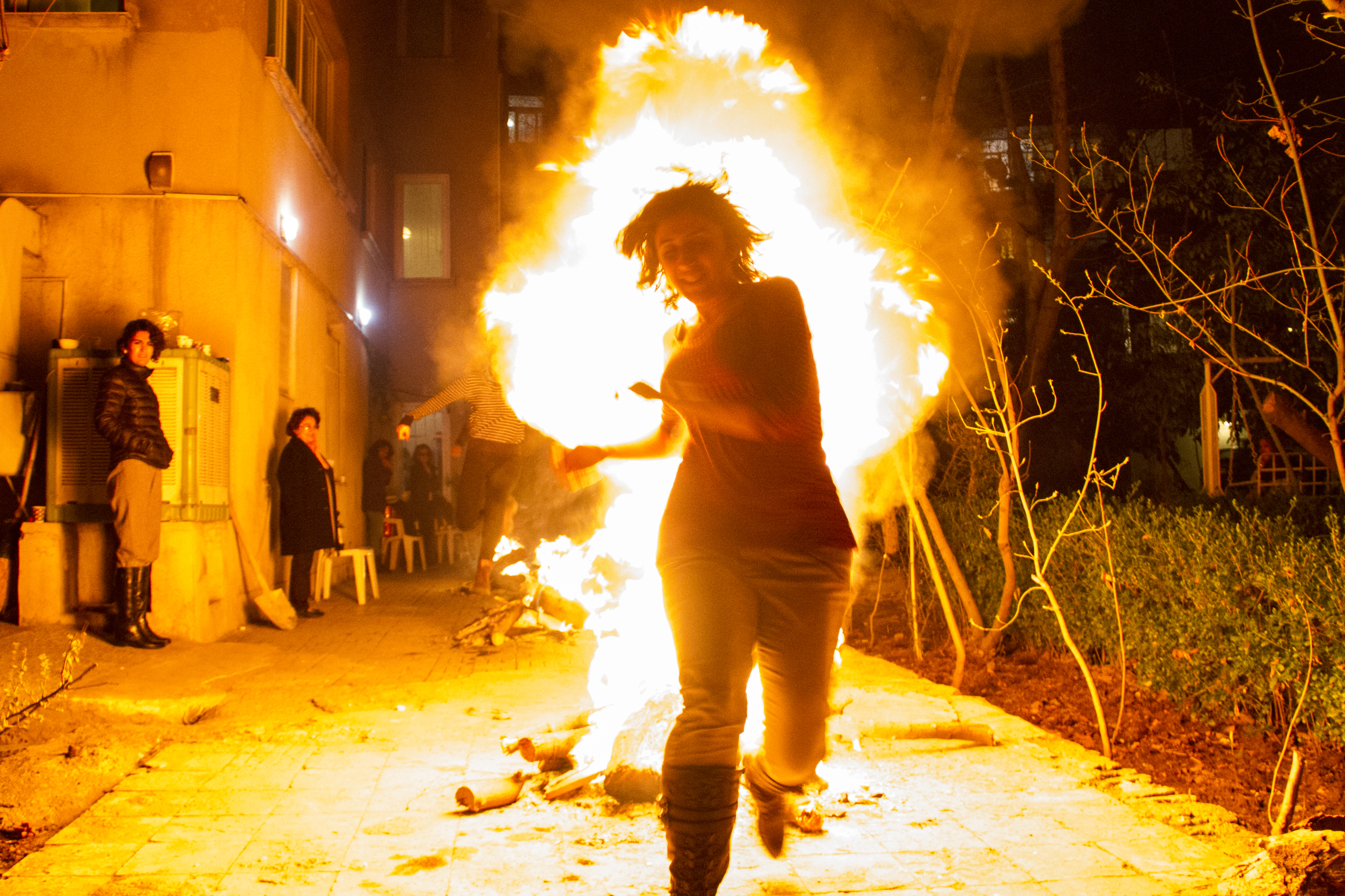 Leaping over the fire on Charshanbeh Suri (photo: Changiz M. Varzi)