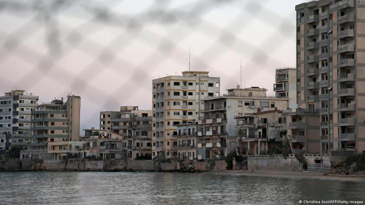 The abandoned resort of Varosha, seen through a wire fence (photo: Christina Assi/AFP/Getty Images)