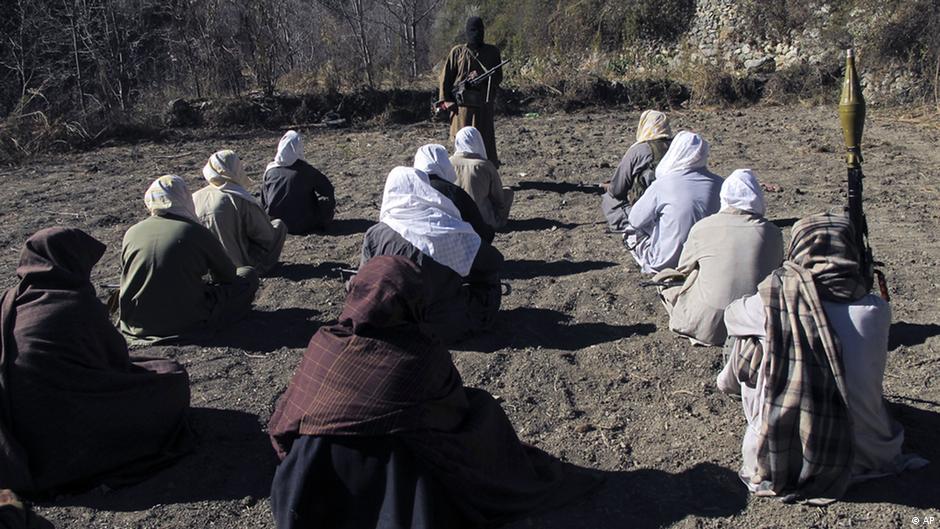 Masked Taliban militants take part in a training exercise in tribal South Waziristan, Pakistan, in 2011 (photo: AP/Ishtiaq Mahsud)